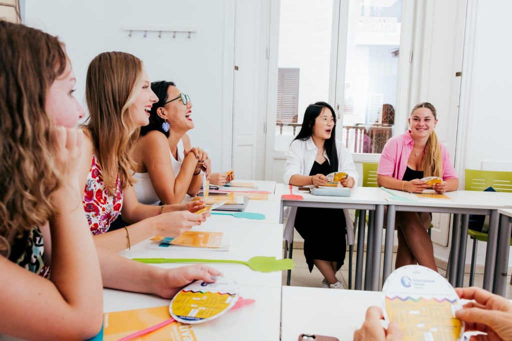 language courses and travel Adult students in the classroom